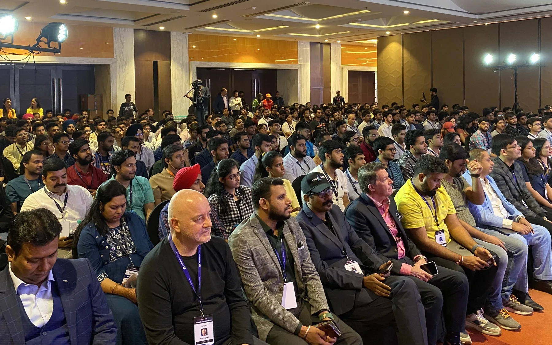 C# Corner community event, a packed hall of developers at a Sharp Economy conference